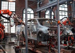 Image result for Robots in Assebling Vehicle