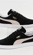 Image result for Black Jeezs with White Puma Shoes