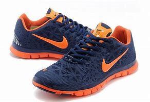 Image result for Navy Blue and Orange Nike Shoes
