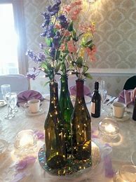 Image result for Wine Bottle Centerpieces with Flowers
