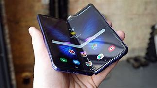 Image result for Samsung Foldable Phone vs iPhone Flip