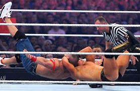 Image result for WrestleMania XXVII John Cena Green Arm Pads