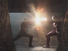 Image result for Iron Man Punching Captain America Shield