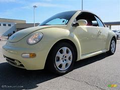 Image result for 2003 Volkswagen Beetle Yellow