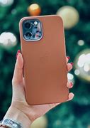Image result for iPhone On Table Leather
