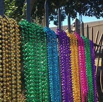 Image result for Pelicans Mardi Gras Colors Logo