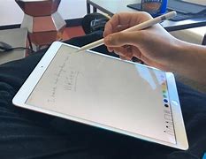 Image result for Apple iPad with an Pen Made Qith It