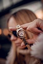 Image result for Profile Pictures of a Arm with a Golden Watch