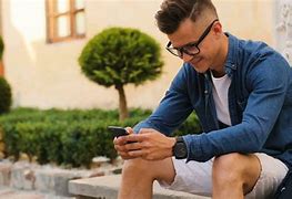 Image result for Young Man On Cell Phone