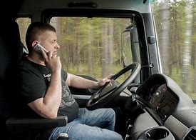 Image result for Truck Driver with Phone