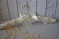 Image result for Wedding Dresses On Hangers
