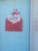 Image result for White Envelope by Door