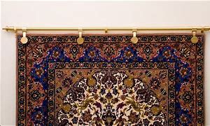 Image result for Rug Clip Display On Wall Hanging