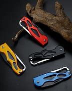 Image result for Spinning Knife Keychain