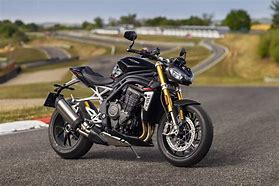 Image result for Black Triumph Speed Triple