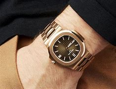 Image result for Profile Pictures of a Arm with a Golden Watch