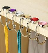 Image result for Purse Hook Architectural Detail