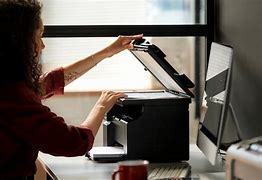 Image result for Black Lady Using a Printer