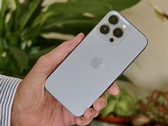 Image result for iPhone 13 Blue On Hand