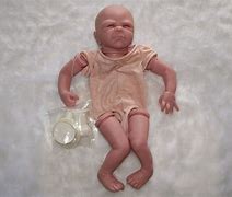 Image result for Weird Baby Doll Faces