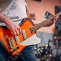 Image result for Bass vs Electric Guitar