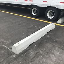 Image result for Concrete Car Stops Parking Lot