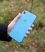 Image result for iPhone XR Blue in Hand