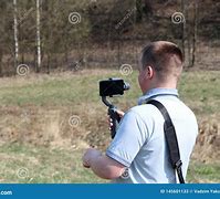 Image result for Person Videotaing