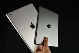 Image result for iPad Mini 2 Silver vs Space Gray