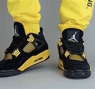 Image result for Jordan 4 Yellow Thunder On Feet