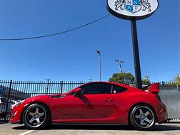 Image result for Red 86 with Chrome Wheels