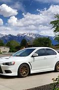 Image result for White EVO with Wheels