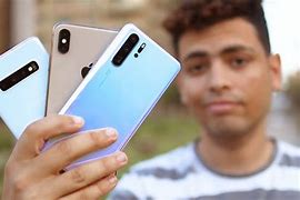 Image result for iPhone XS Max vs Huawei P20 Pro
