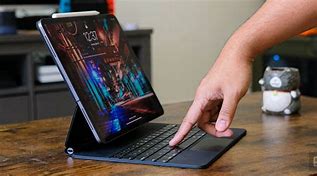 Image result for iPad Air with Magic Keyboard and Pencil