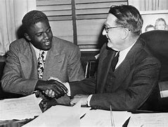 Image result for Picture of Jackie Robinson Signing with the Brooklyn Dodgers