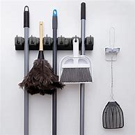 Image result for Mop and Broom Holders Wall Mounted