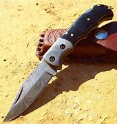 Image result for Damascus Dagger Leather Hande