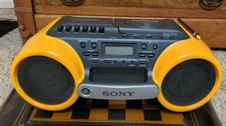 Image result for Yellow Sony Boombox CD Radio