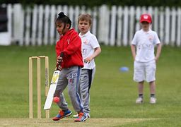 Image result for Child Playing Cricket