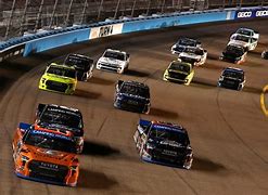 Image result for NASCAR Truck with Wheels On the Side