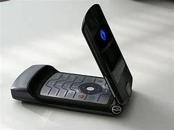 Image result for Vintage Grey Motorola Flip Phone