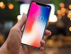 Image result for Holding iPhone