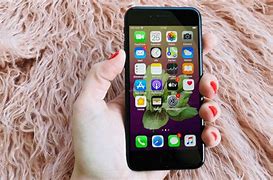 Image result for iPhone SE in the Hand of Someone