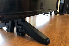 Image result for TCL Roku TV 55 Stand without Pedestals