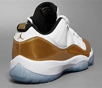 Image result for Air Jordan 11 Gold