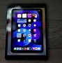 Image result for iPad Mini in Hand