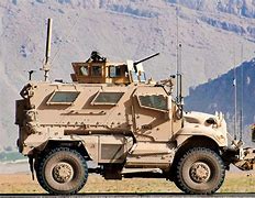 Image result for MRAP Next to a Tank