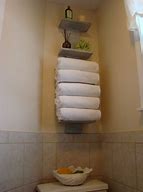 Image result for Bathroom Towel Shelves Over Toilet
