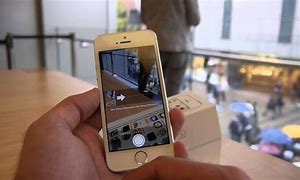 Image result for Silver iPhone 5S in Hand