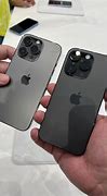 Image result for iPhone 14 Pro Black in Hand